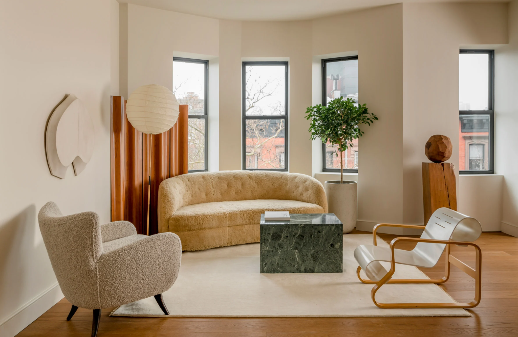 warm neutral room with golden oak wood floor paneling