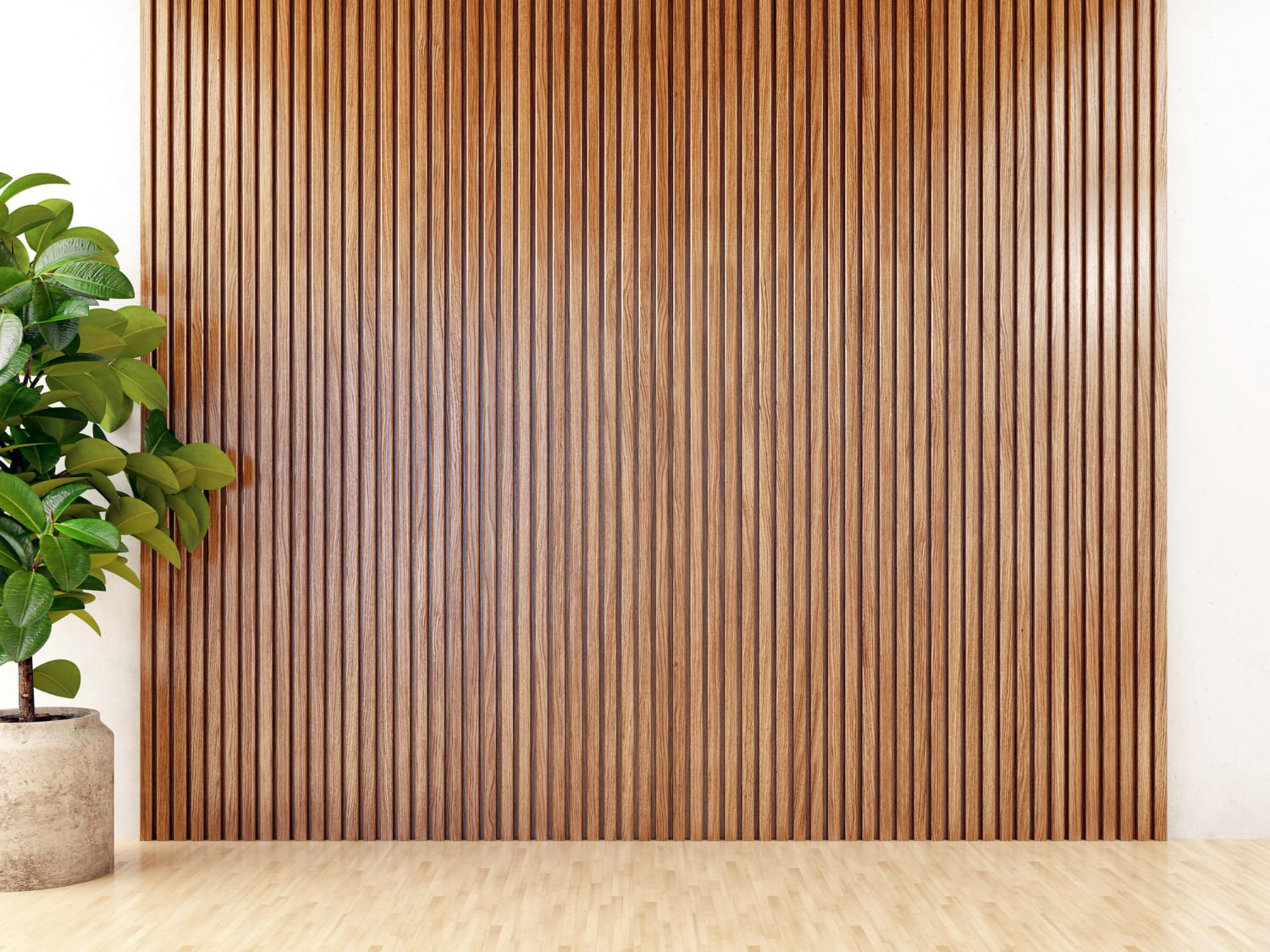 Modern vertical wood slat feature wall with potted plant in a minimalist room.