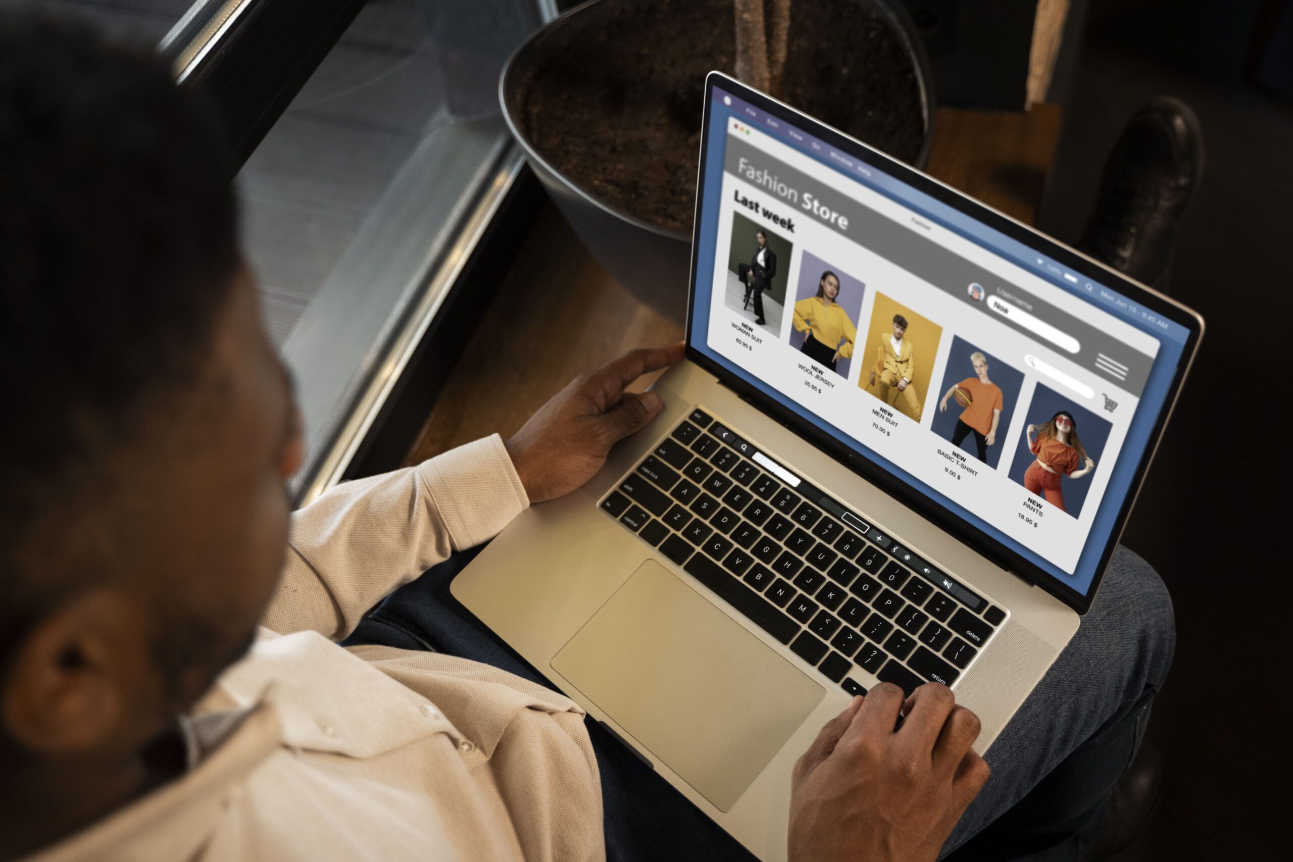 A person browsing an online store on a laptop.